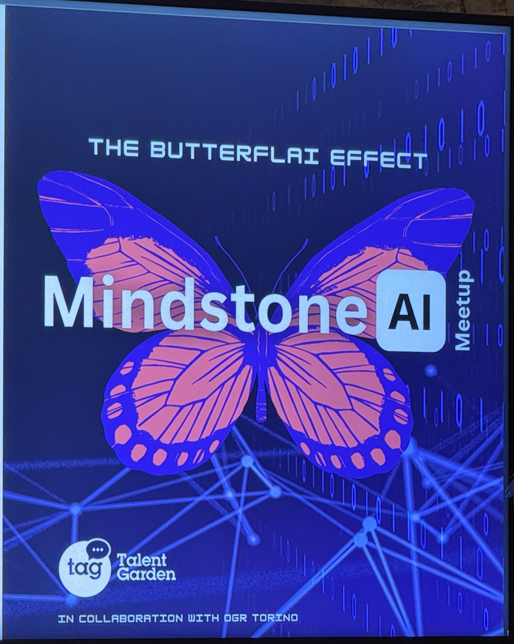 An event screen showing The ButterflAI Effect, Mindstone AI Meetup, Talent Garden and OGR Torino.